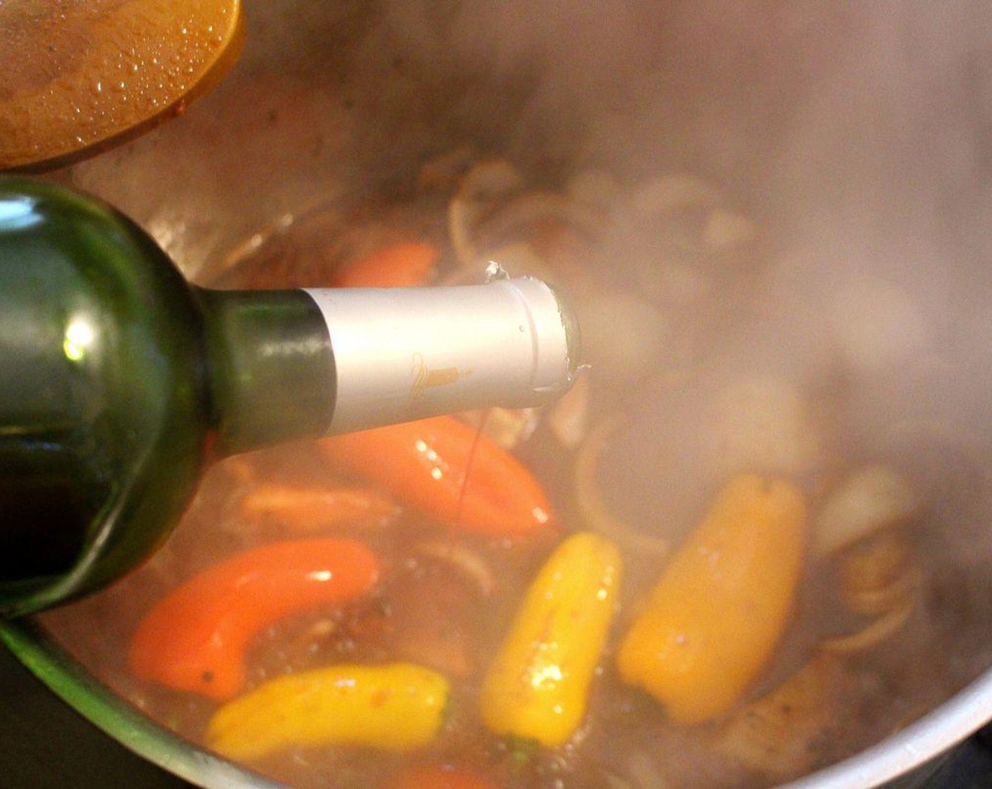 step 4 Add Merlot (8 cups) and Water (4 cups), deglaze the pot.