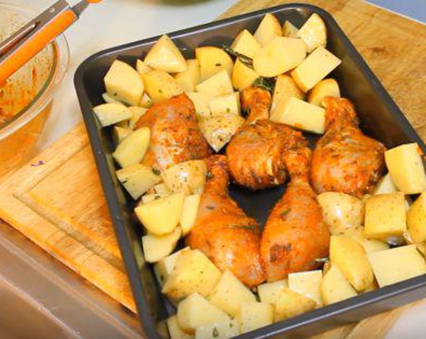 step 4 In a 9 x 19 inch pan, lay the chicken pieces in the middle. Sprinkle the potatoes around the chicken. Cook at 425 degrees F (220 degrees C) for 60-70 minutes.