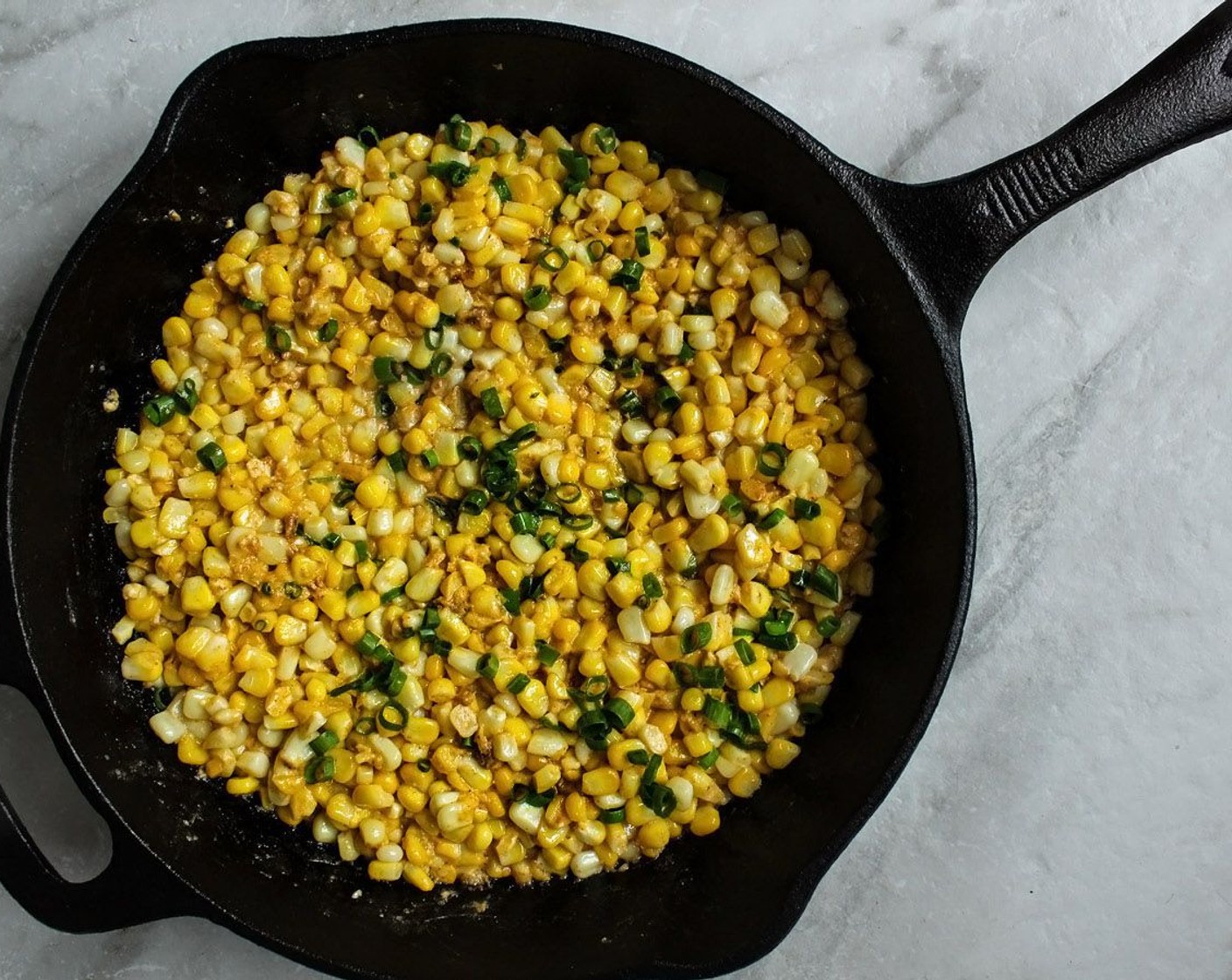 step 6 Set the stove to medium heat and melt the Butter (1 Tbsp) in a pan. Add in the corn mixture and cook for 10-15 minutes.