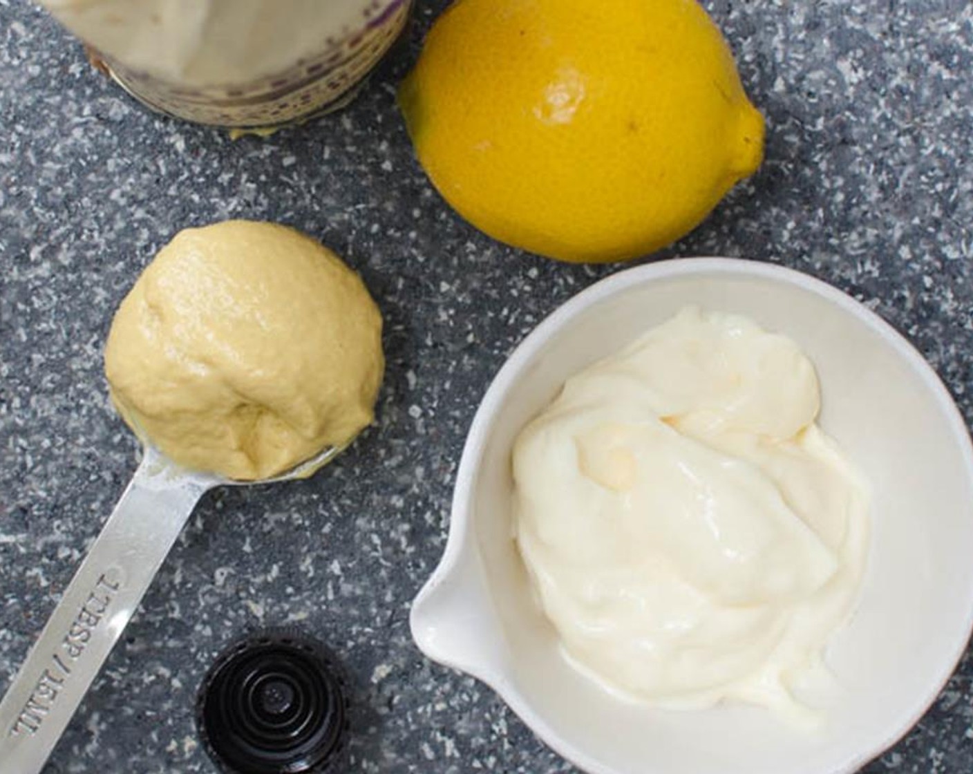 step 3 Zest the Lemon (1) before juicing a tablespoon from it.