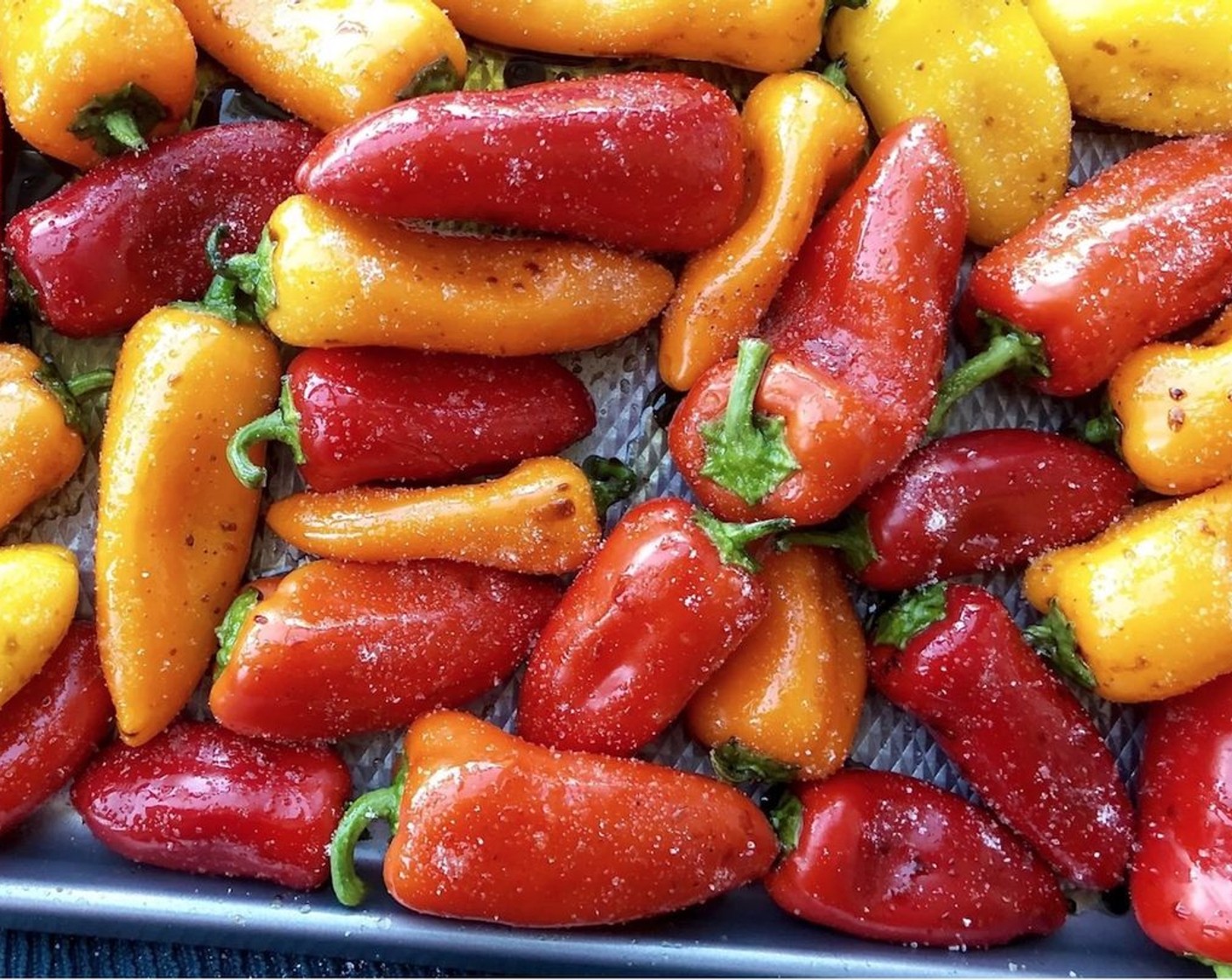 step 2 Place Mini Peppers (4 1/2 cups) in a 9x13-inch pan or baking dish. Coat the peppers with the Extra-Virgin Olive Oil (1/4 cup) and Balsamic Vinegar (3 Tbsp). Season with the Kosher Salt (1 tsp) and toss to coat.