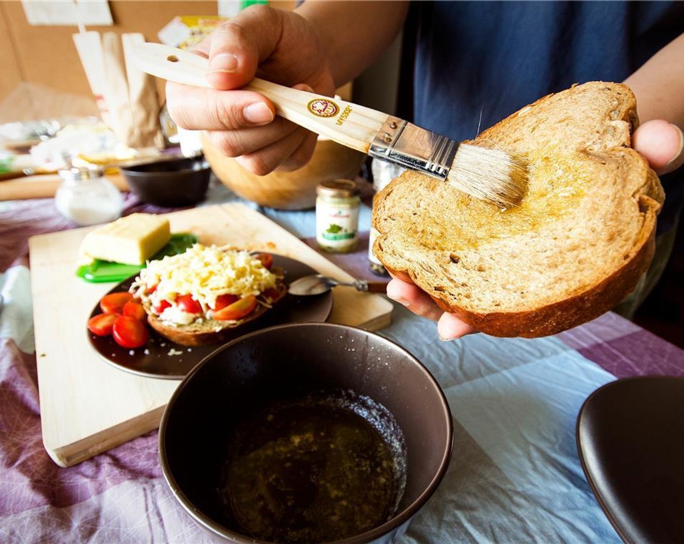 step 2 Brush the outside of each Bread (4 slices) with enough Olive Oil (2 Tbsp) to lightly coat the bread.