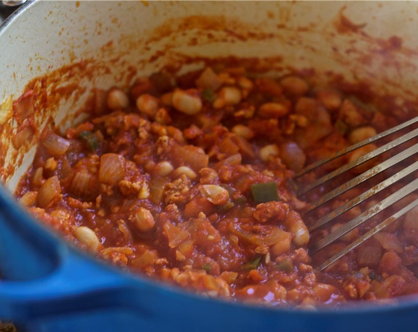 step 5 Add the Canned Tomato Purée (1 1/2 cups) and Lima Beans (1 1/2 cups) then simmer until the sauce is thick and the sausage is cooked, about 5 minutes on medium heat. Taste and add Salt (to taste) and Ground Black Pepper (to taste) as needed.