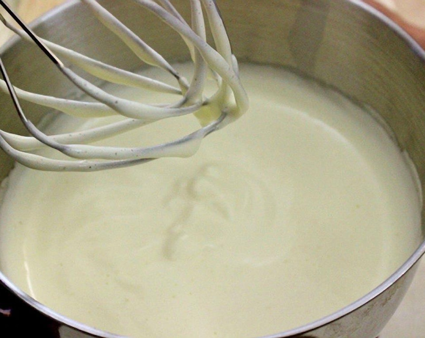 step 3 Vigorously whisk Eggs (6) and Granulated Sugar (1 cup) together until they are pale yellow and foamy.