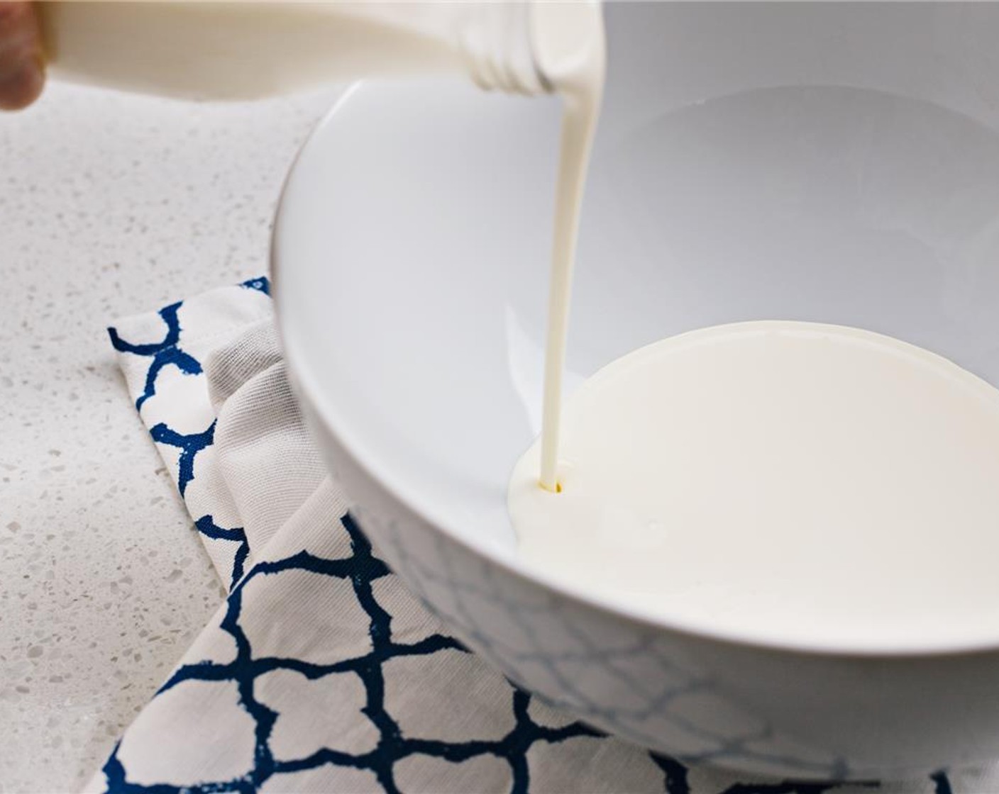 step 1 Put Heavy Cream (8 oz) and Powdered Confectioners Sugar (2 Tbsp) in a large bowl.