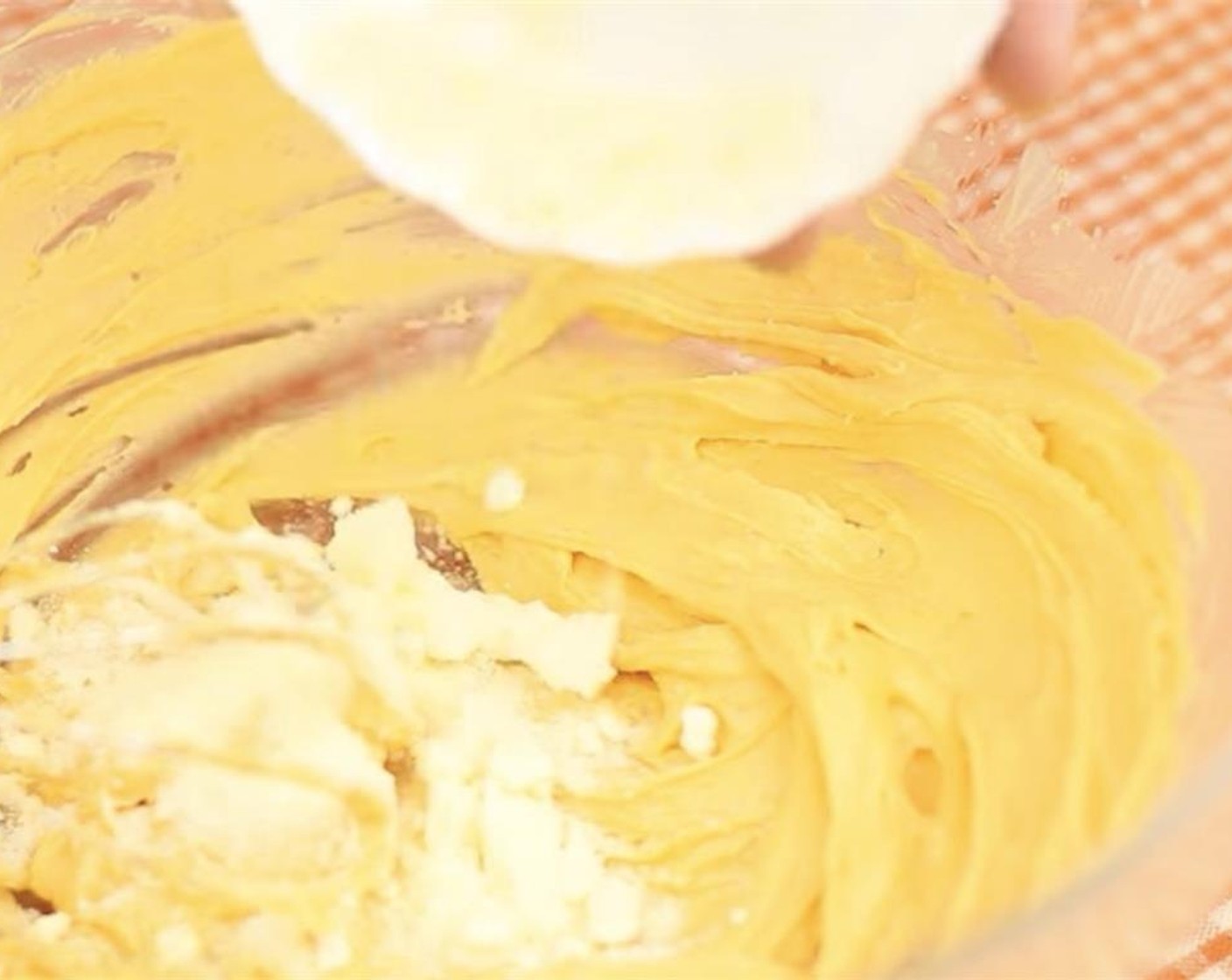 step 3 Mix in Salted Egg Yolk Powder (1/2 cup). Combine in Milk Powder (2 tsp).