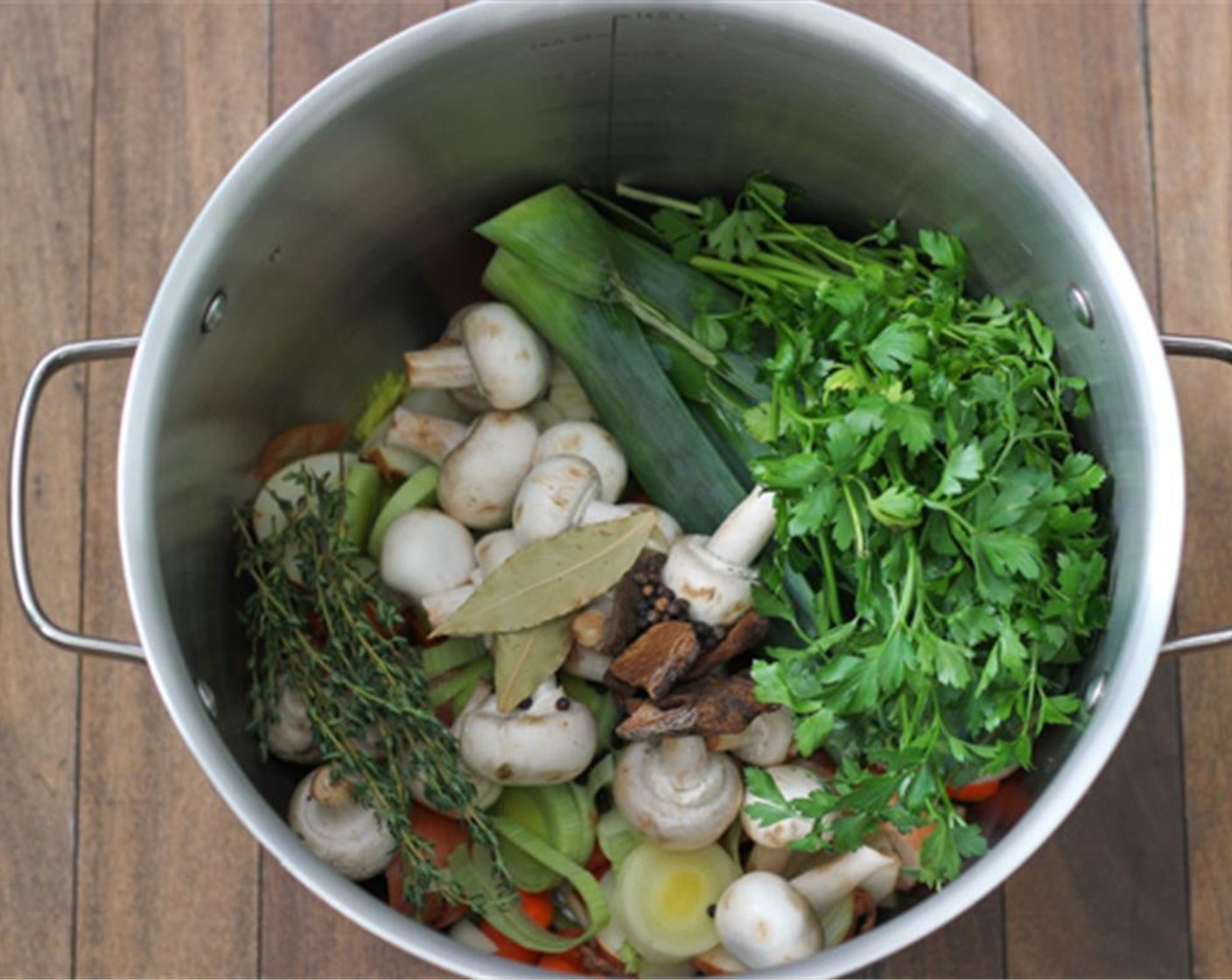 step 4 Add the rest of the ingredients Mushrooms (2 1/4 cups) , Dried Porcini Mushrooms (3 Tbsp), Fresh Thyme (10), Black Peppercorns (1 Tbsp) , and Bay Leaves (2).