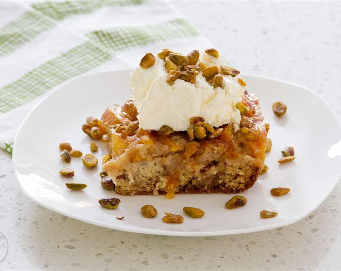 step 7 Bake until browned and bubbly, about 30 minutes. Let cool slightly before serving with Whipped Cream (to taste) and Pistachios (to taste). Enjoy!