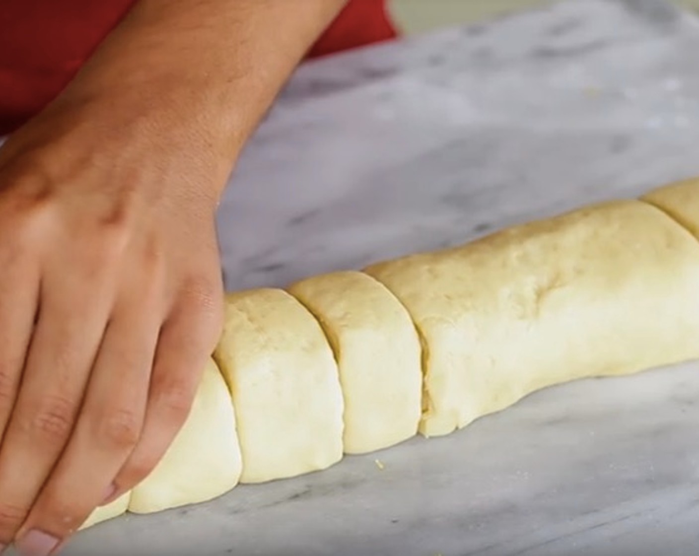 step 10 Roll the dough up and cut it into 14-16 individual rolls.