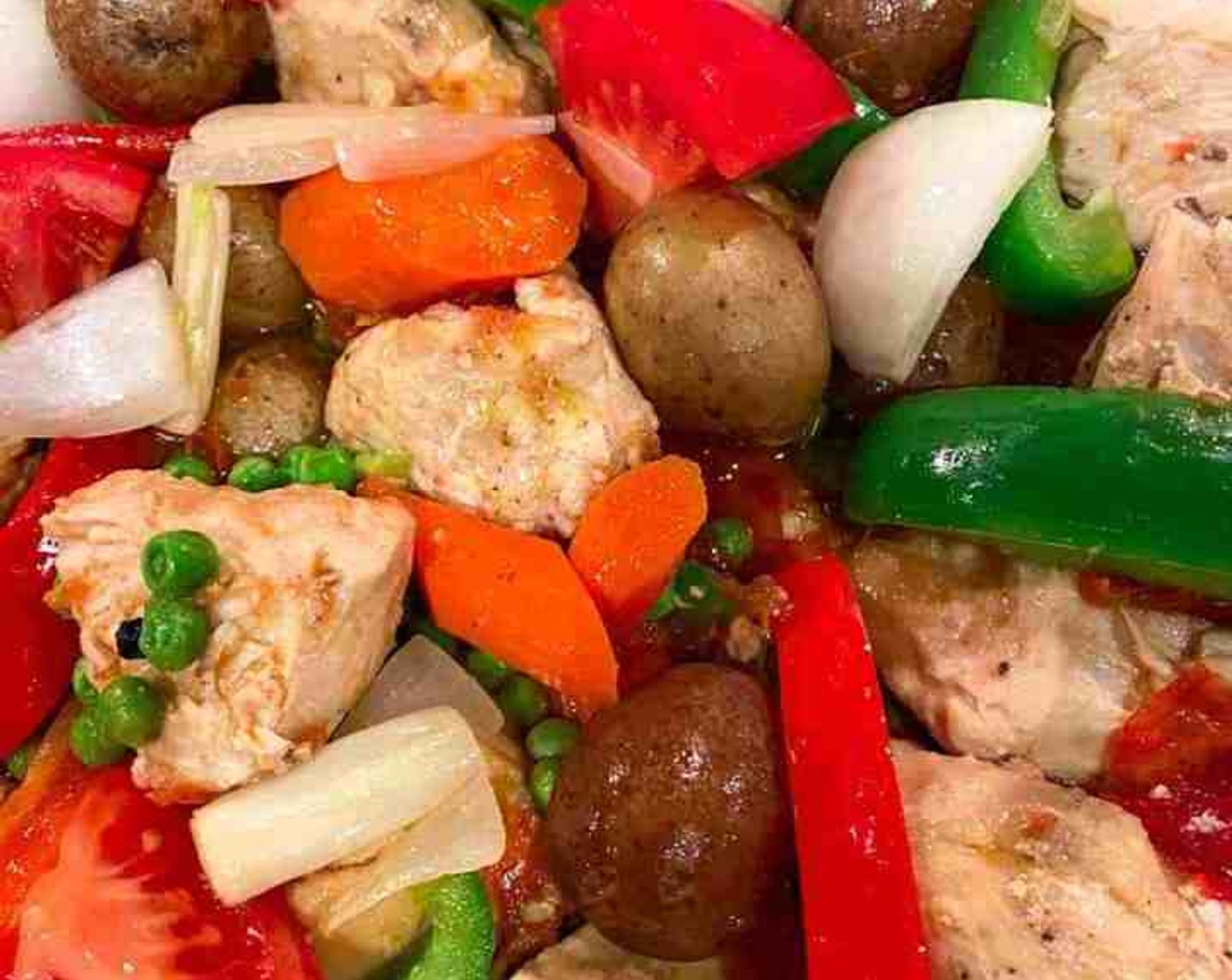 step 7 Uncover and then add Red Bell Pepper (1/2), Green Bell Pepper (1/2), and Green Peas (1/2 cup) and cook for an additional 2 minutes. Serve while warm. Enjoy!