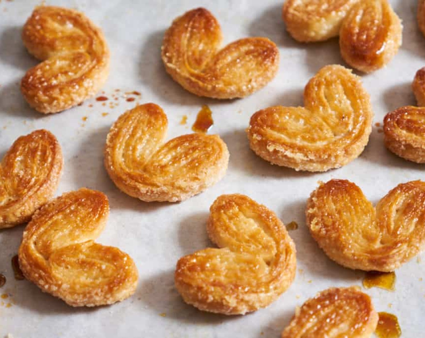 step 10 Remove palmiers from the oven and allow them to cool on a wire rack. Again, transfer them with an offset spatula and take care not to burn your fingers.