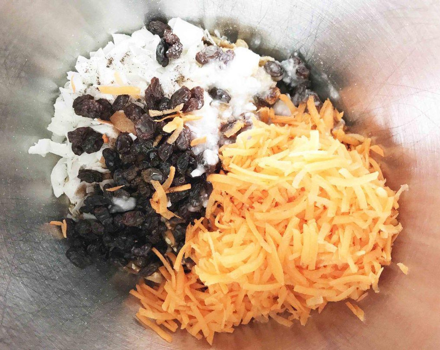 step 3 In a large bowl, mix together Old Fashioned Rolled Oats (2 cups), shredded carrot, Unsalted Raw Pecans (1 cup), Raw Walnuts (1 cup), Unsweetened Coconut Flakes (1/2 cup), {@11:}, Maple Syrup (1/4 cup), Coconut Oil (1/4 cup), Ground Cinnamon (1 tsp), {@12:}, Ground Ginger (1/4 tsp), {@10:}, Ground Nutmeg (1/8 tsp), and Ground Cloves (1 pinch)