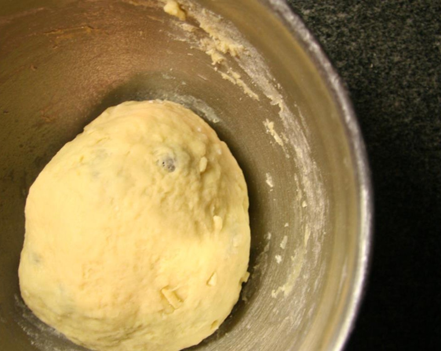 step 7 Sprinkle with additional flour as necessary to keep the dough from sticking. Continue to knead until the dough feels smooth and elastic, about 5 minutes.