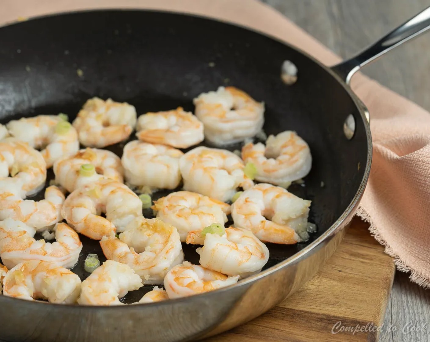 step 4 Add Shrimp (1 lb) in a single layer. Cook shrimp 2 minutes per side and remove from pan.