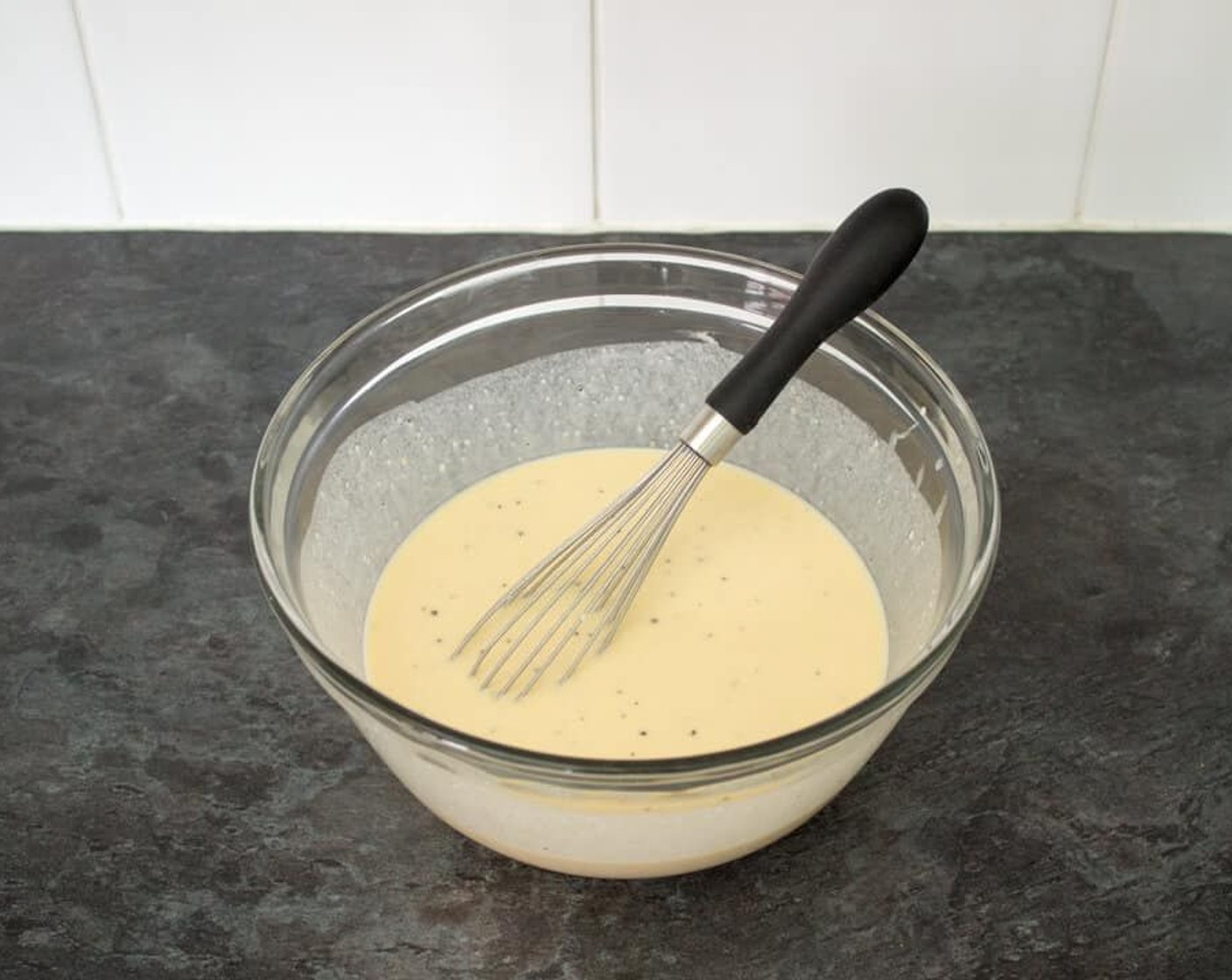step 4 Beat together the Eggland's Best Classic White Eggs (4), Milk (3/4 cup) and the melted butter in a jug. Gradually pour the mixture into the flour and whisk constantly. Continue until all the liquid is in the bowl and the batter is nice and smooth.