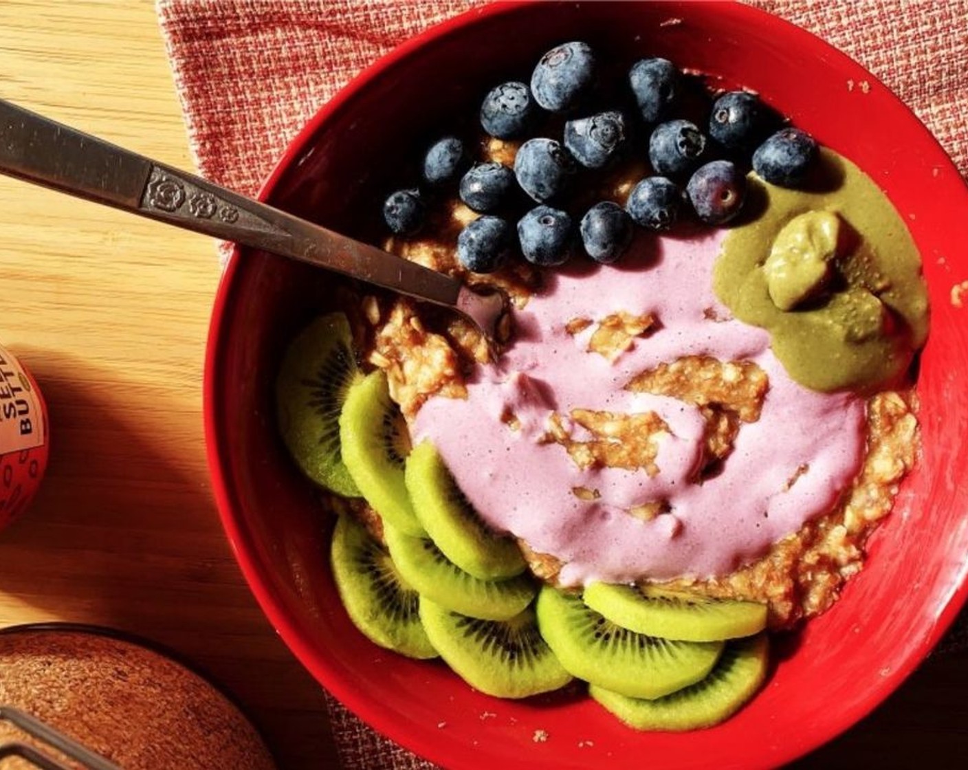 step 5 Top your oatmeal with Blueberry Kefir (2 Tbsp), Pumpkin Seed Butter (1 tsp), Fresh Blueberry (1/4 cup) and Kiwifruit (1/2). Serve it up!