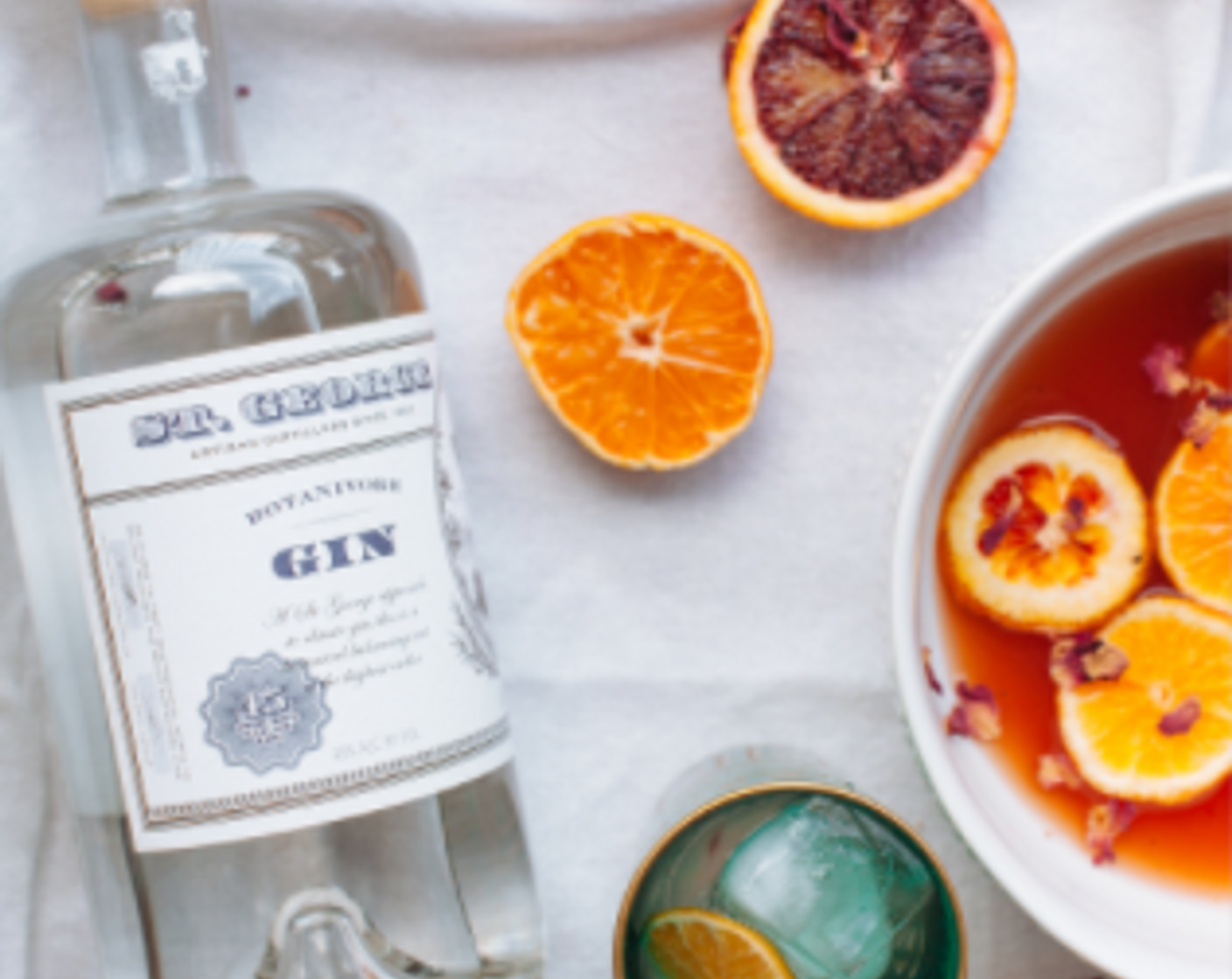 step 3 Combine 1 part Botanical Gin (to taste) and 2 parts shrub in a punch bowl. Top with Oranges (to taste).