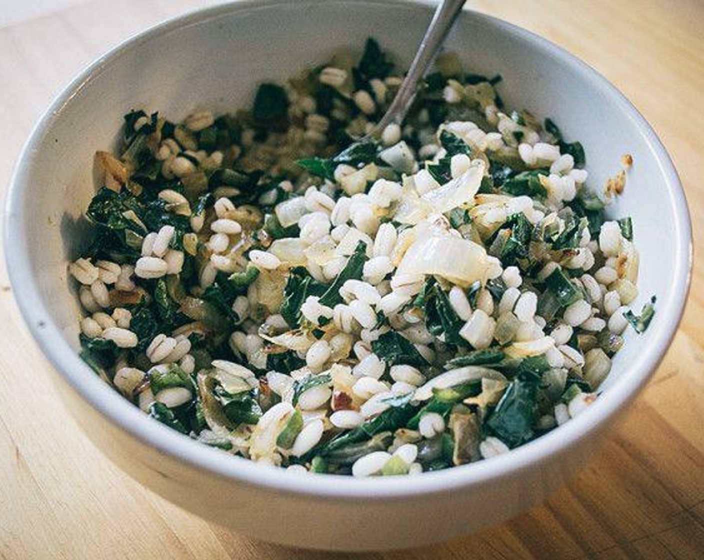 step 5 Add Tuscan Kale (1 cup) to the pan and cook until tender/crispy. Remove kale, peppers, and onions from the pan, add to a small bowl and combine with cooked barley.