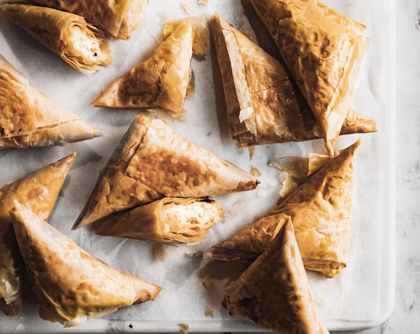 step 9 Bake triangles until they are nicely golden, about 20-25 minutes. If baking from frozen add an extra 5 minutes of bake time. Enjoy!