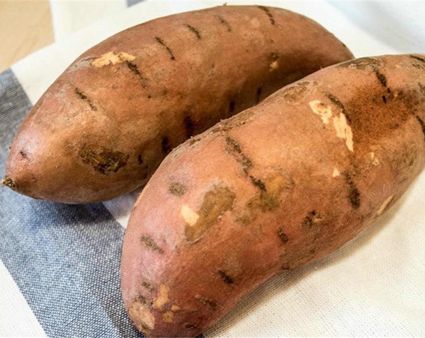 step 5 Wash Sweet Potatoes (4) and prick them with a fork and bake for 30 minutes.