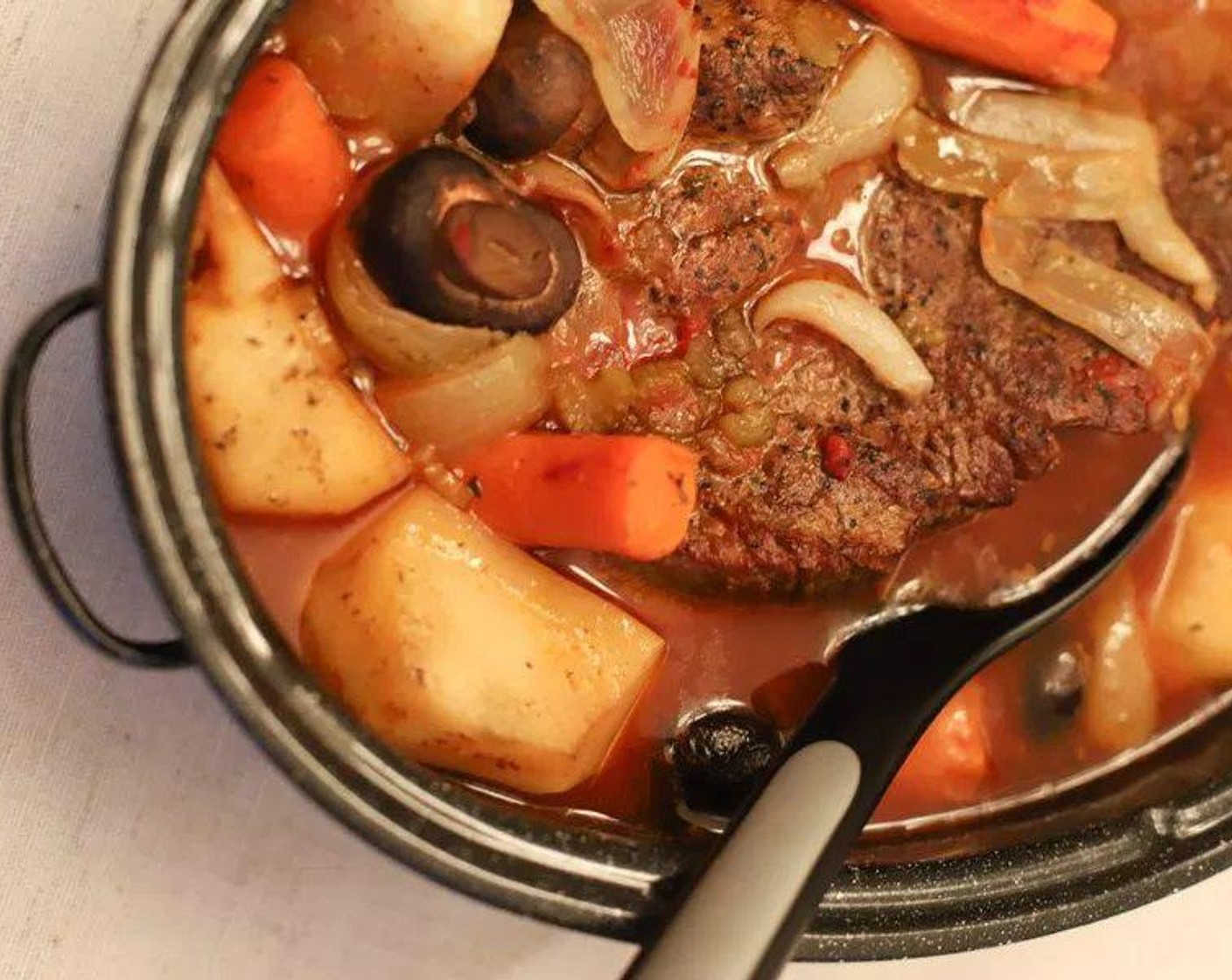 step 7 Bake in the preheated oven in a covered pan for 1 hour. Drop temperature to 225 degrees F (105 degrees C) and bake for another 2 hours. Use a bulb baster to pour liquid over meat every 60 minutes.