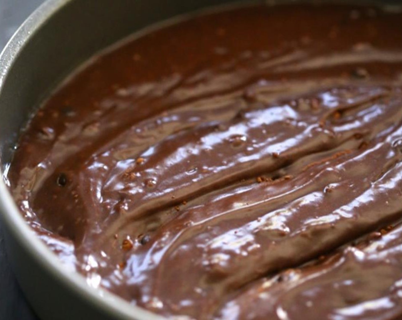 step 4 Fold in the mini chocolate Mini Chocolate Chips (1/3 cup) and pour batter into cake pan. Bake for about 25 minutes.