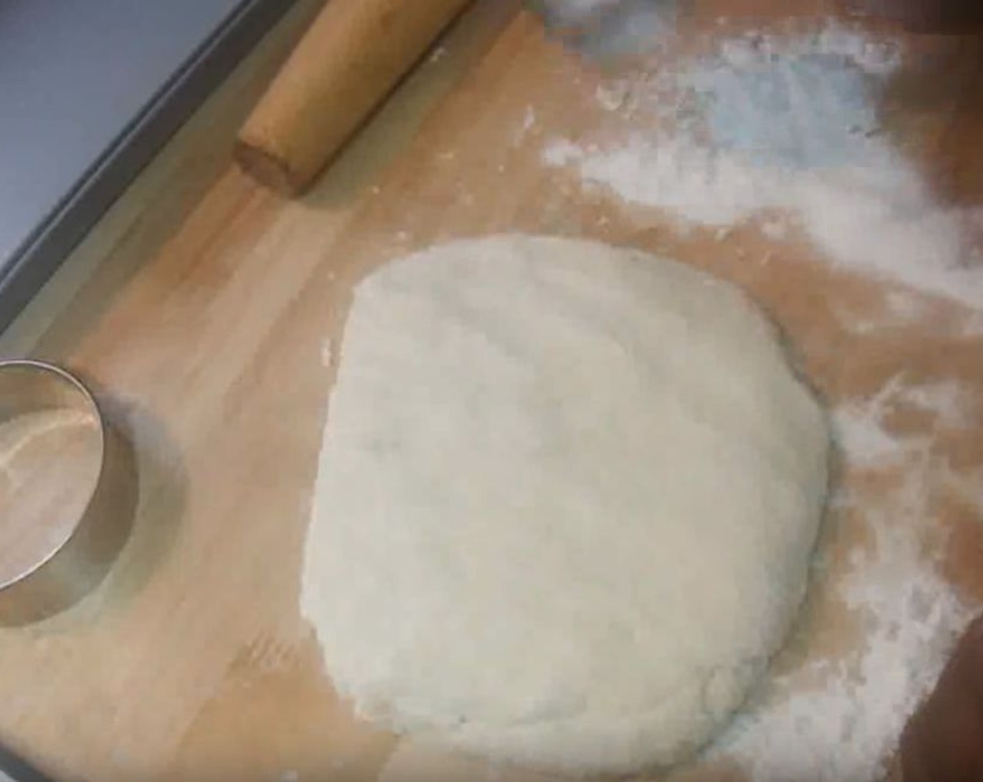 step 5 Turn the dough out onto a lightly floured surface. Knead until dough is no longer sticky. Roll it out to 1/4-inch thick.