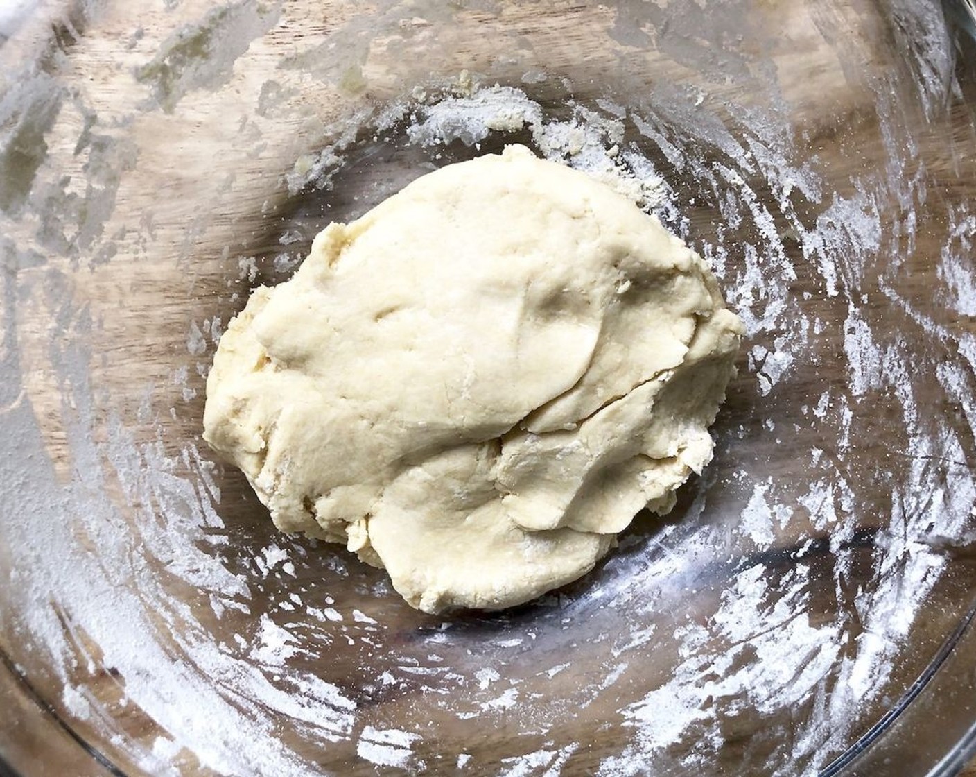 step 4 Add the Einkorn Flour (1 1/4 cups) and continue to mix with a fork as much as you can, then use your hands to knead the dough in the bowl until it holds together.