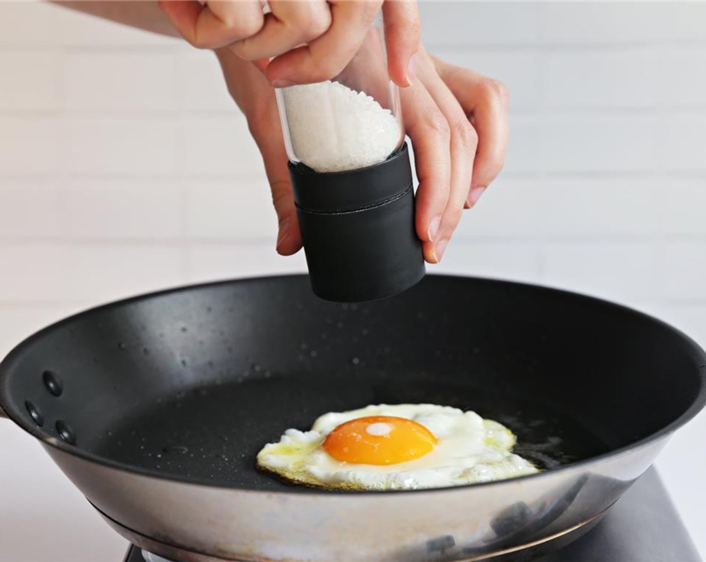 step 4 Turn off heat and season egg with Salt (to taste) and Ground Black Pepper (to taste).