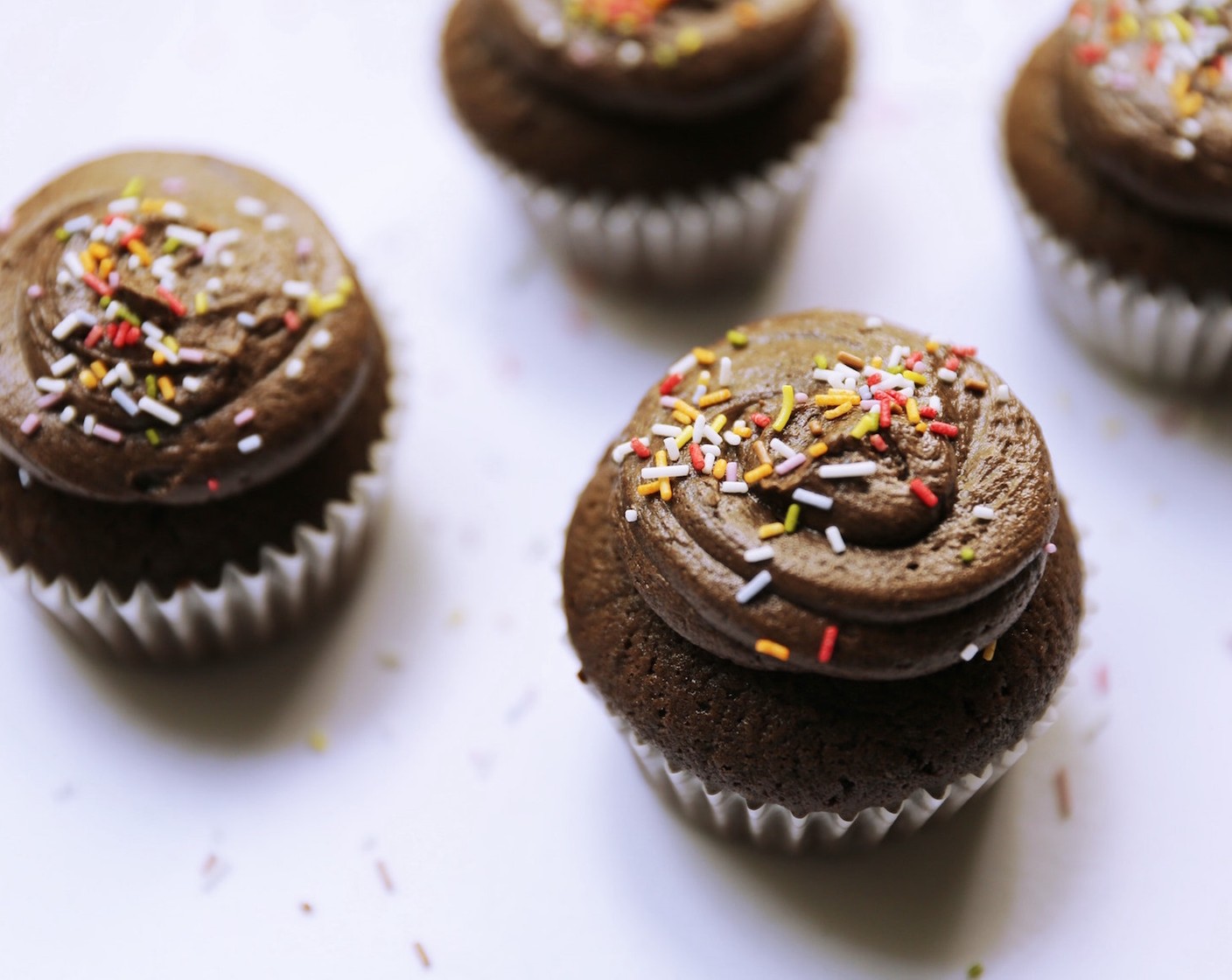 step 12 Top each cupcake with frosting and decorate with Sprinkles (to taste).