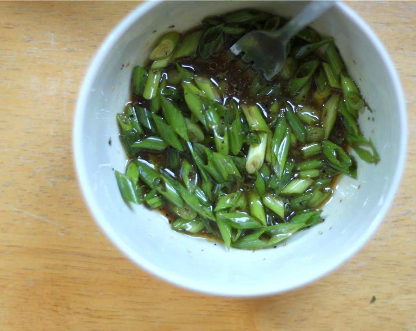 step 5 Whisk the Olive Oil (2 Tbsp), Balsamic Vinegar (3 Tbsp), Honey (1 Tbsp), 1 tablespoon of lemon juice and Salt (to taste) and Ground Black Pepper (to taste) in a bowl.  Stir in the Scallion (1/2 cup) to coat them and add flavor.