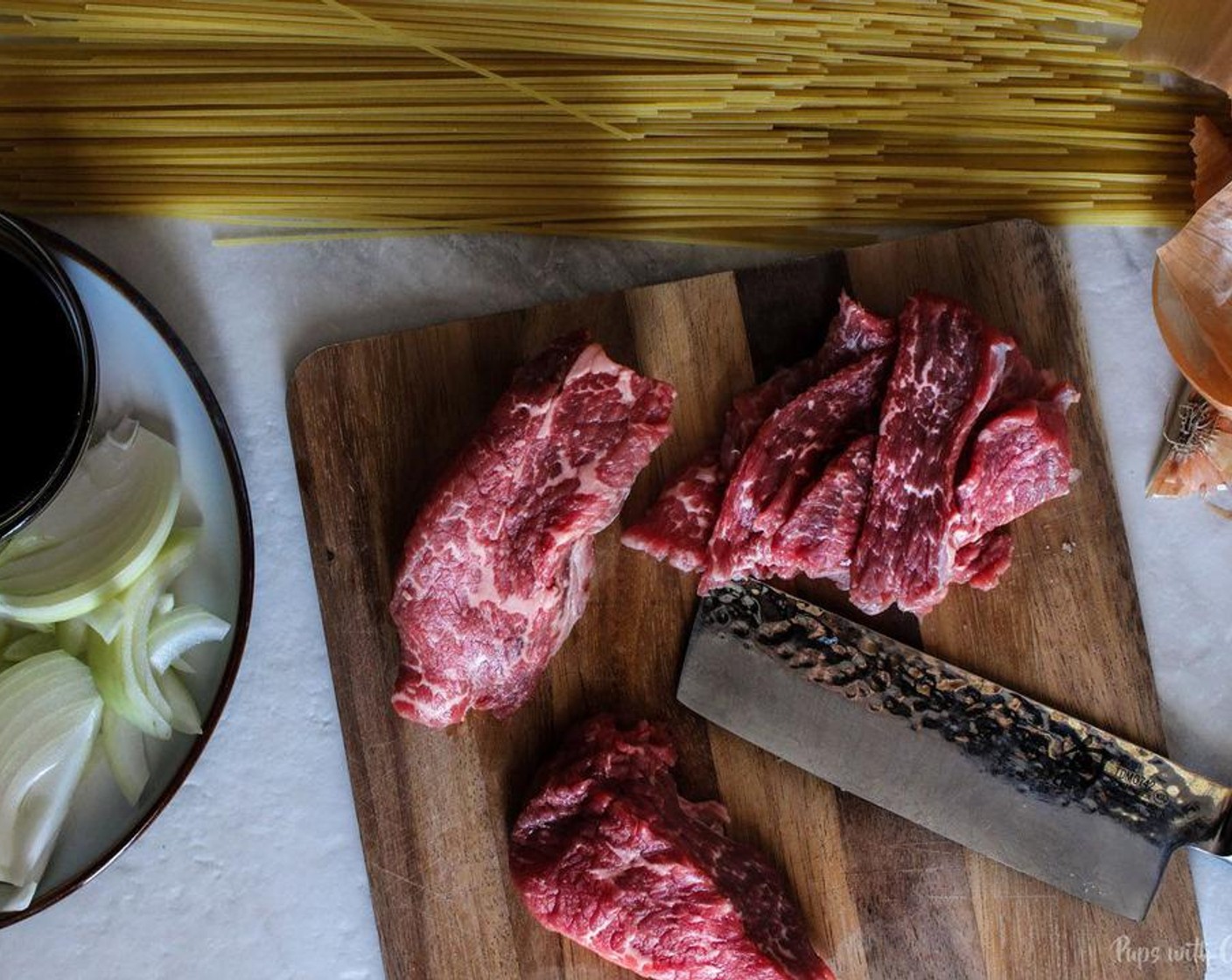 step 3 Cut the Sirloin Steak (1.1 lb) thinly against the grain, put it into a bowl then add Corn Starch (1 tsp).