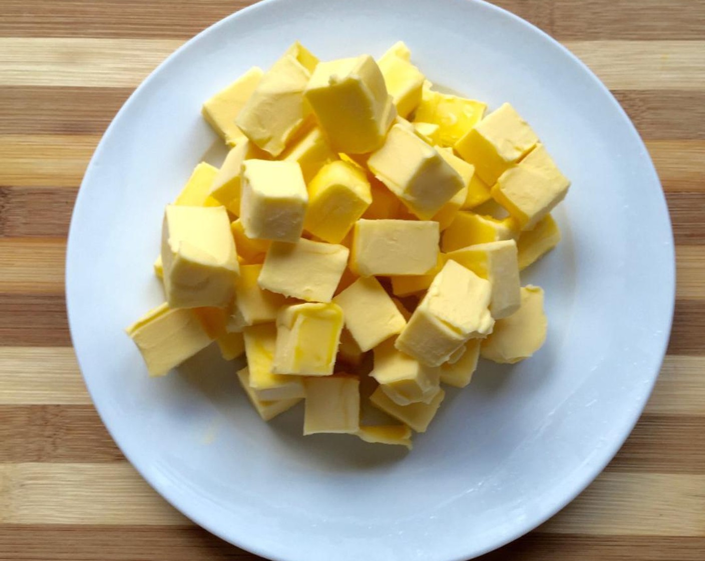 step 5 Cut cold Butter (1 cup) straight from the refrigerator into cubes and leave to chill in the refrigerator until ready to be used.