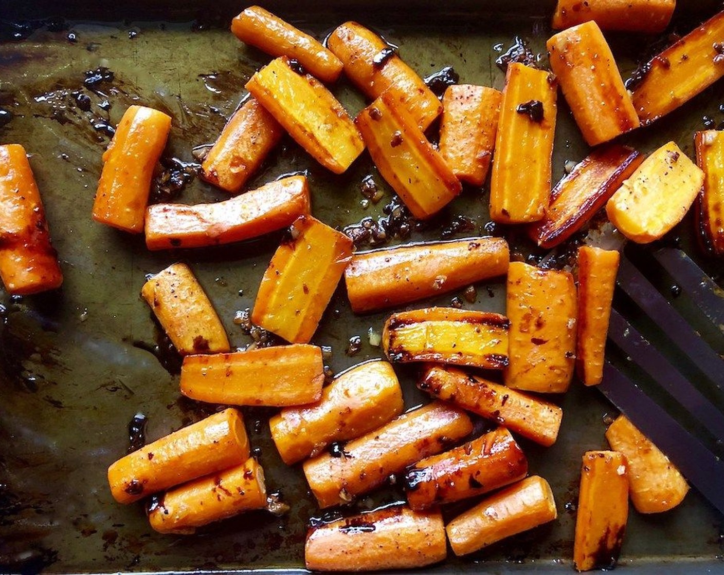 step 7 Roast for 20 minutes or until the carrots are fork-tender. If you'd like them to be more charred, place them under the broiler for 2 to 3 minutes.
