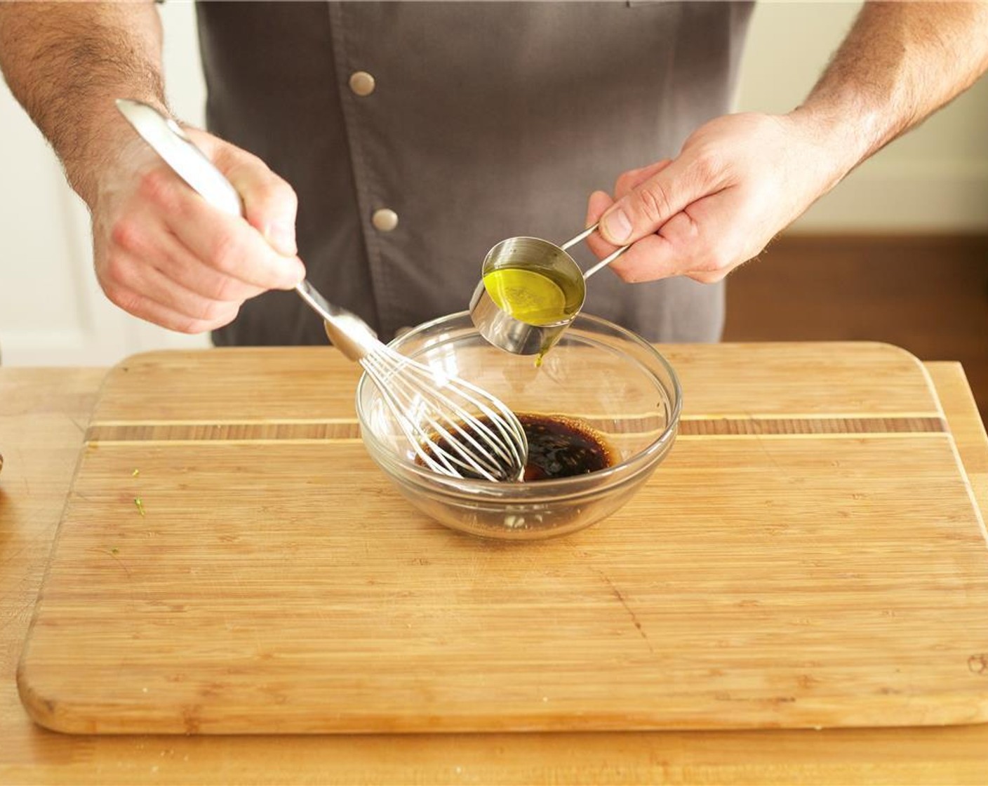step 6 Combine the Maple Syrup (1 tsp) and Balsamic Vinegar (2 Tbsp) in a small bowl and stir. Slowly whisk in remaining olive oil and set aside.