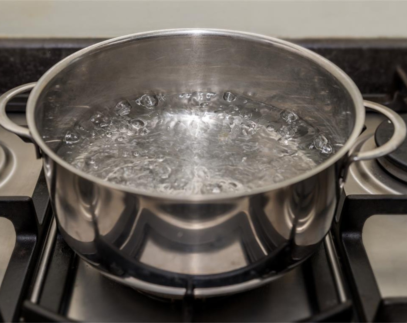 step 2 Fill a saucepan with a few inches of water, and bring to a simmer.