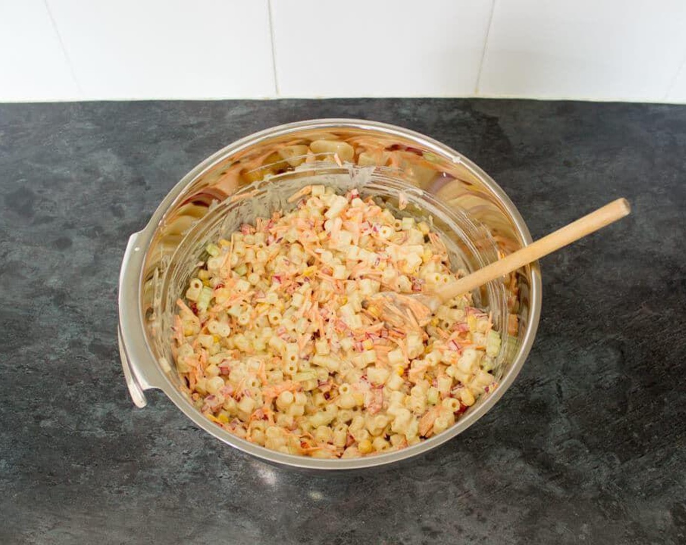 step 5 Put the vegetables in a large enough bowl and stir through the cooked pasta. Finally pour over all that lovely dressing and give it a really good mix to ensure everything is nicely coated.