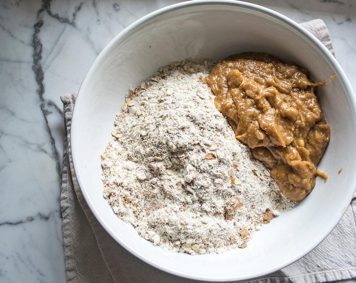 step 2 In a large bowl, mix Ground Oats (2 cups), Old Fashioned Rolled Oats (1 cup), Bran Flakes (1 cup), Flaxseeds (1/4 cup) and Protein Powder (1 cup) together.