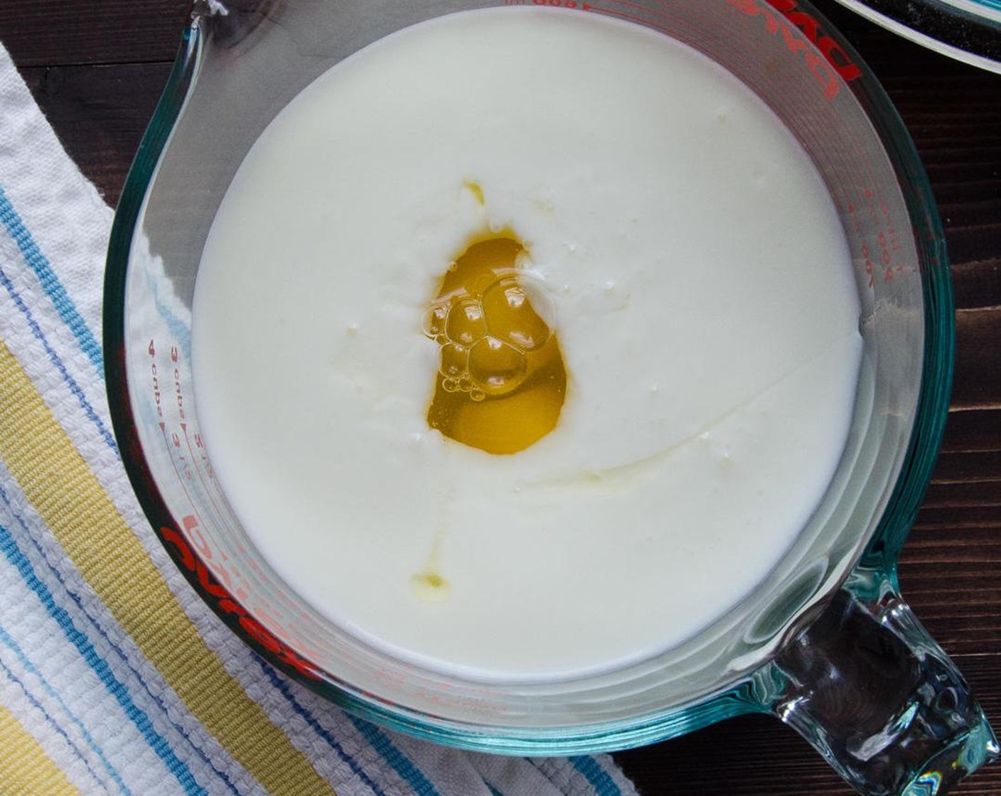 step 2 In a medium bowl, whisk together the Farmhouse Eggs® Large Brown Eggs (2), Buttermilk (2 cups), and Unsalted Butter (1/4 cup).