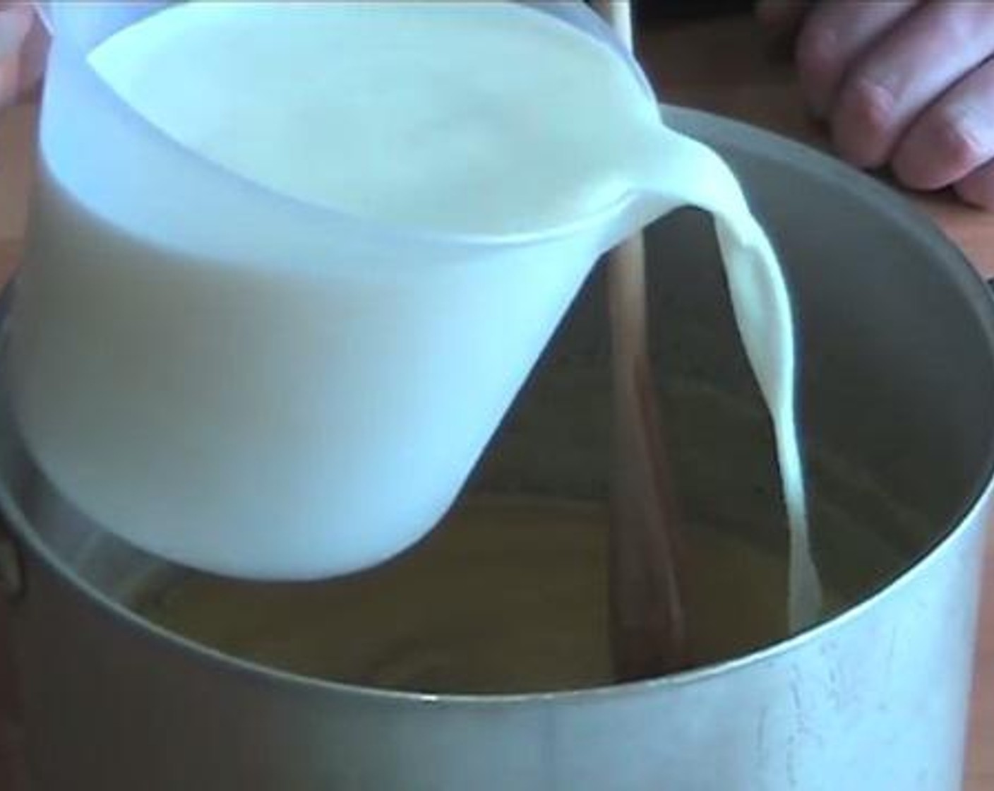 step 2 In a cooking pot, melt the Butter (2 oz) and cook together with the All-Purpose Flour (1/3 cup) for about a minute. Take the pot off the stove and add in the Milk (4 cups) a little bit every time.