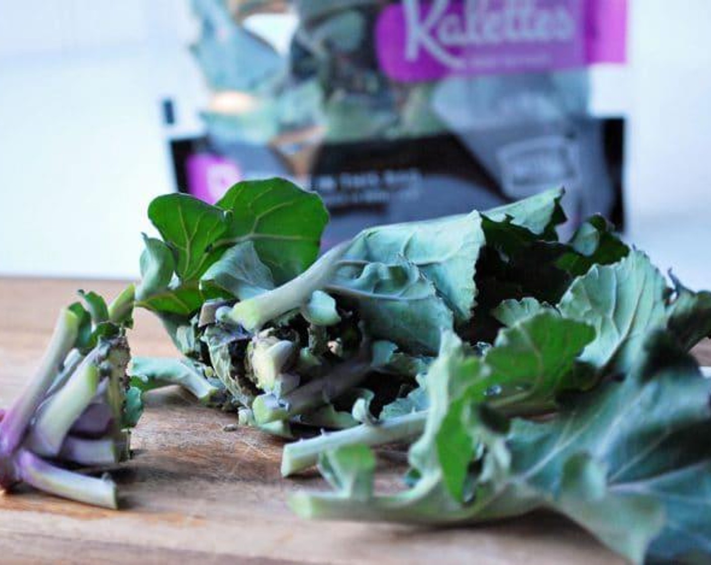 step 1 Cut the stem off the bottom of the Kalettes™ (6 cups) and place into a large bowl. Add Extra-Virgin Olive Oil (1/2 Tbsp) to the leaves and massage leaves to thoroughly coat. Sprinkle leaves with Coarse Salt (to taste) and set aside to sit for 10 minutes.