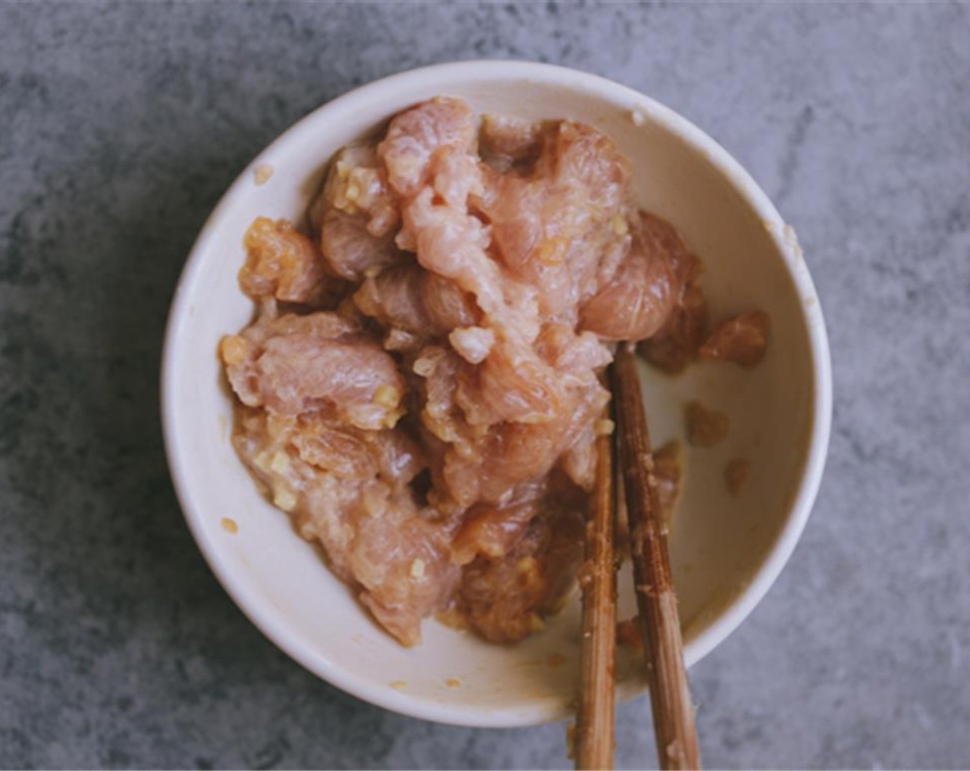step 1 Combine the Pork Tenderloin (3.5 oz) with Sesame Oil (1 tsp), Water (2 Tbsp), Corn Starch (2 tsp), Light Soy Sauce (2 tsp), and Salt (1 pinch). Do a little message to make sure the pork slices absorb the sauces well. Set aside for 30 minutes.