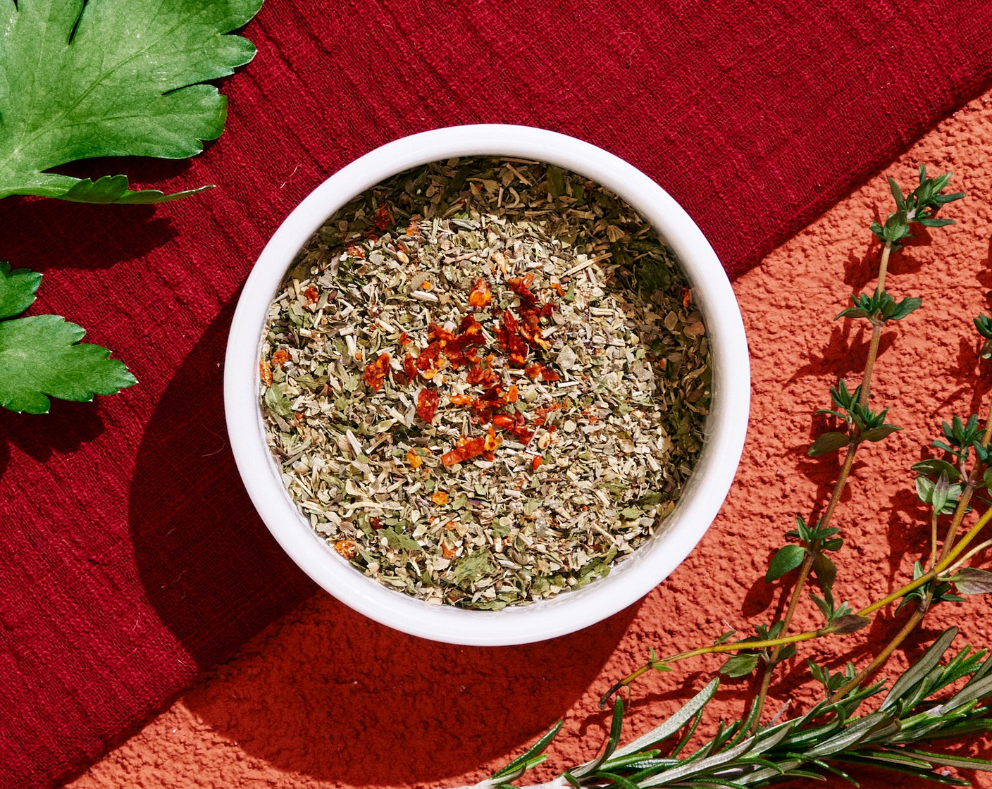 step 1 In a small bowl or jar, add Dried Basil (2 Tbsp), Dried Oregano (2 Tbsp), Dried Parsley (1 Tbsp), Dried Thyme (1 Tbsp), Dried Rosemary (1/2 Tbsp), McCormick® Garlic Powder (1 tsp), and Crushed Red Pepper Flakes (1 tsp) and mix until combined. Store in an airtight container.