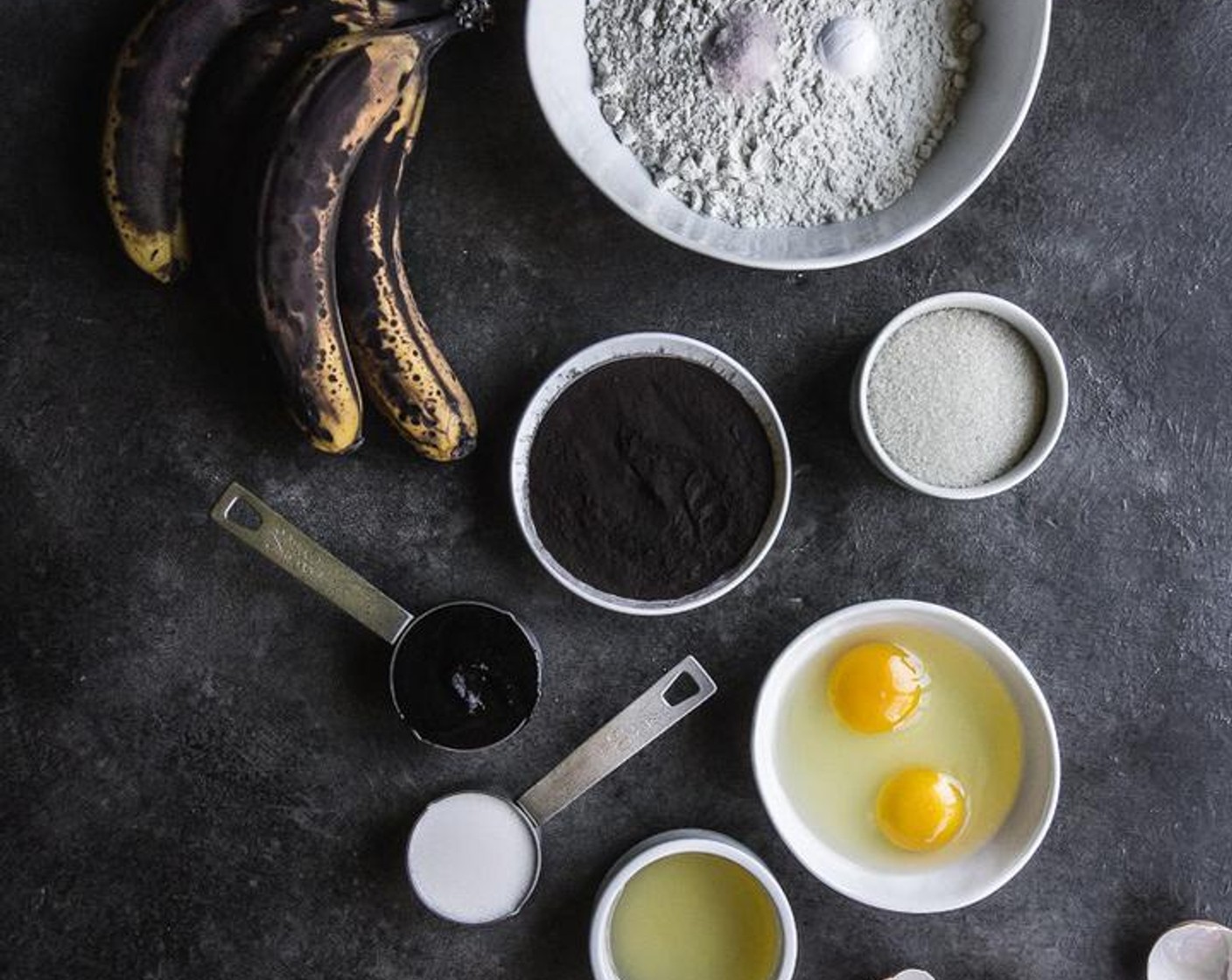 step 3 In a bowl, whisk the All-Purpose Flour (1/2 cup), Black Cocoa Powder (1/4 cup), Baking Powder (3/4 tsp),  Baking Soda (1/2 tsp), and Salt (1/2 tsp) together until well combined.