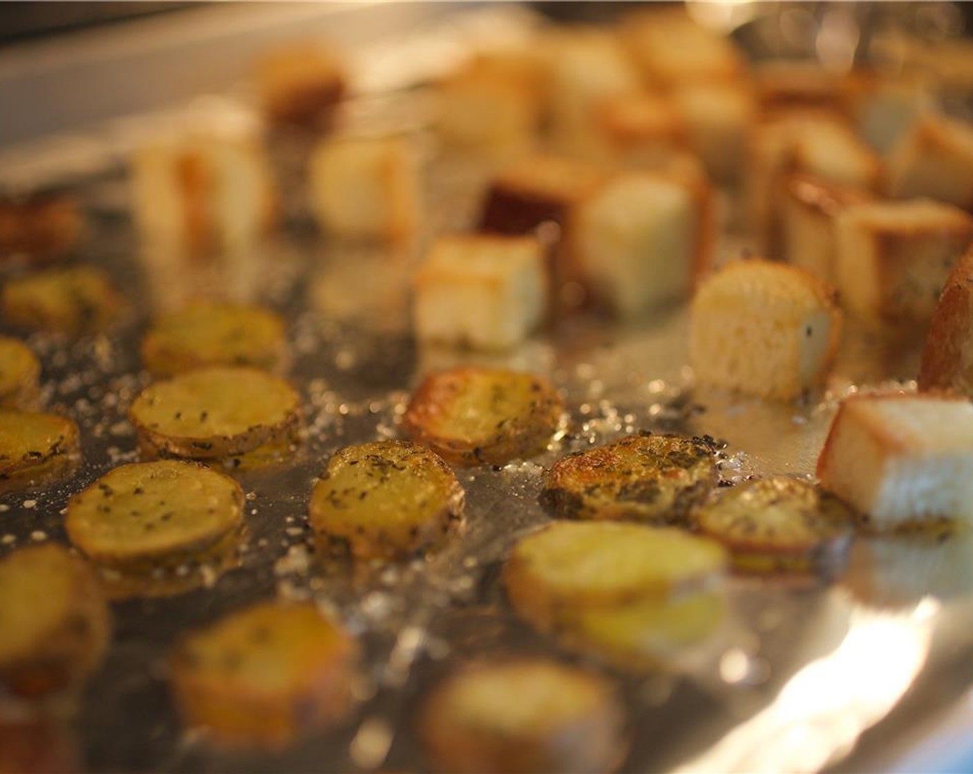 step 2 Slice the Fingerling Potatoes (1 1/2 cups) into 1/4 inch thick circles and place in a large bowl. Toss potatoes with Fresh Rosemary (1/3 cup), 1 teaspoon oil, 1/2 teaspoon of salt and a pinch of pepper.