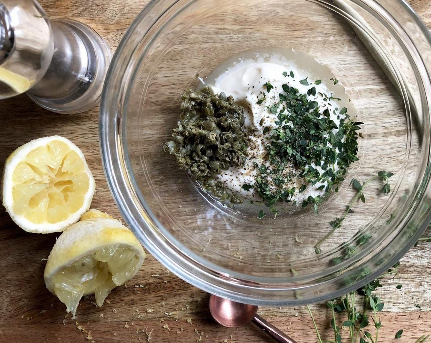 step 2 Meanwhile, for the lemon caper aioli, in a small bowl stir together the Mayonnaise (1/3 cup), 2 tablespoons Lemon (1) juice, Capers (1 Tbsp), Fresh Thyme (1 tsp) and Ground Black Pepper (1/8 tsp). Mix well and set aside.