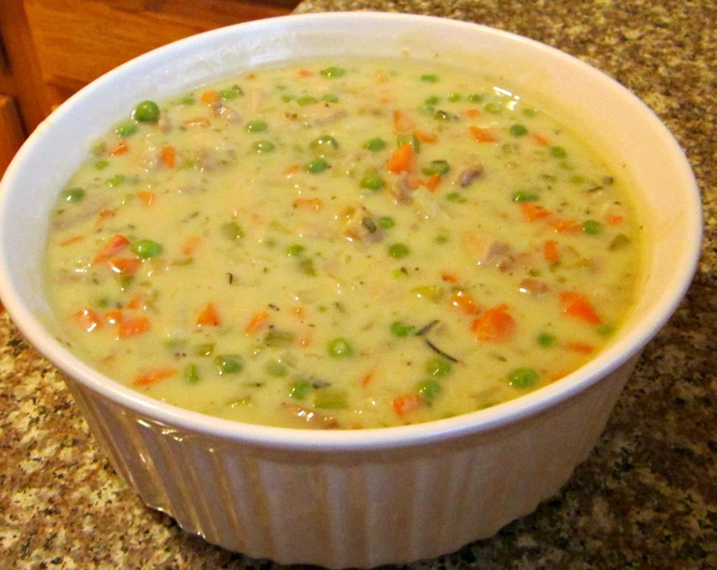 step 5 Add Salt (to taste), Ground Black Pepper (to taste), Fresh Thyme (1 Tbsp), Fresh Rosemary (1 tsp), and Chicken Bouillon Cubes (to taste). Stir well and then add Fat-Free Half And Half (4 Tbsp).