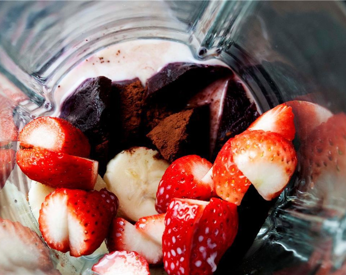 step 1 Place Beet (1), Fresh Strawberries (10), Unsweetened Almond Milk (1 cup), Agave Syrup (1 tsp), Vanilla Bean Paste (1/2 tsp) and Raw Cocoa Powder (1 tsp) in the blender.