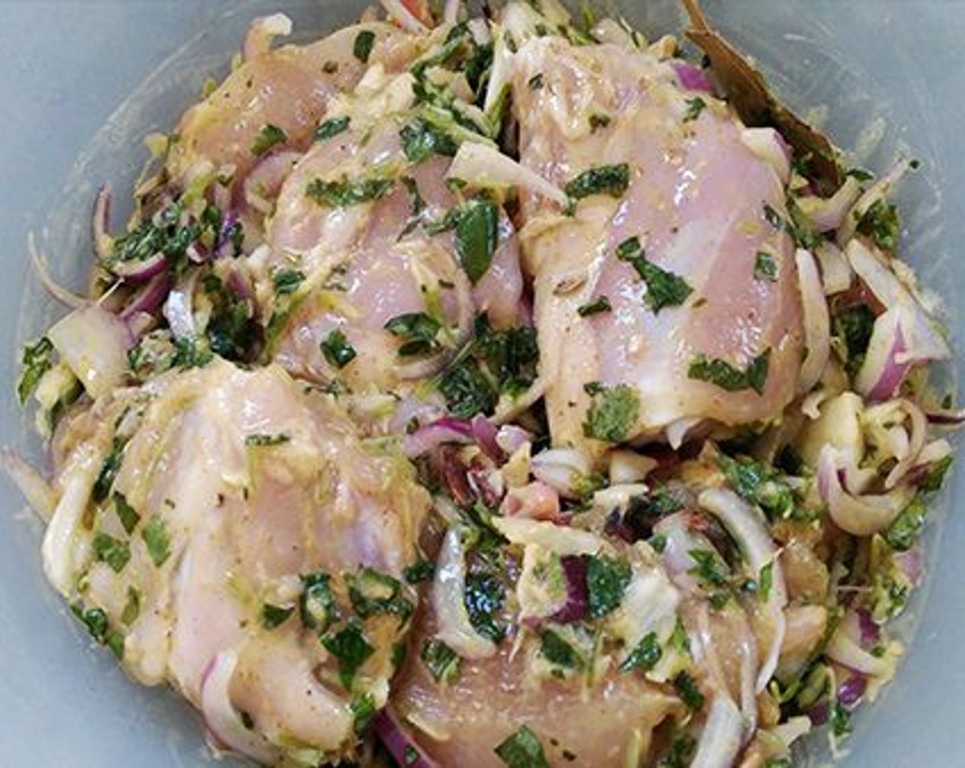 step 3 Marinate cut chicken with Onions (3), Fresh Ginger (2 Tbsp), Garlic (2 Tbsp), Green Chili Peppers (8), and Tomato (1).