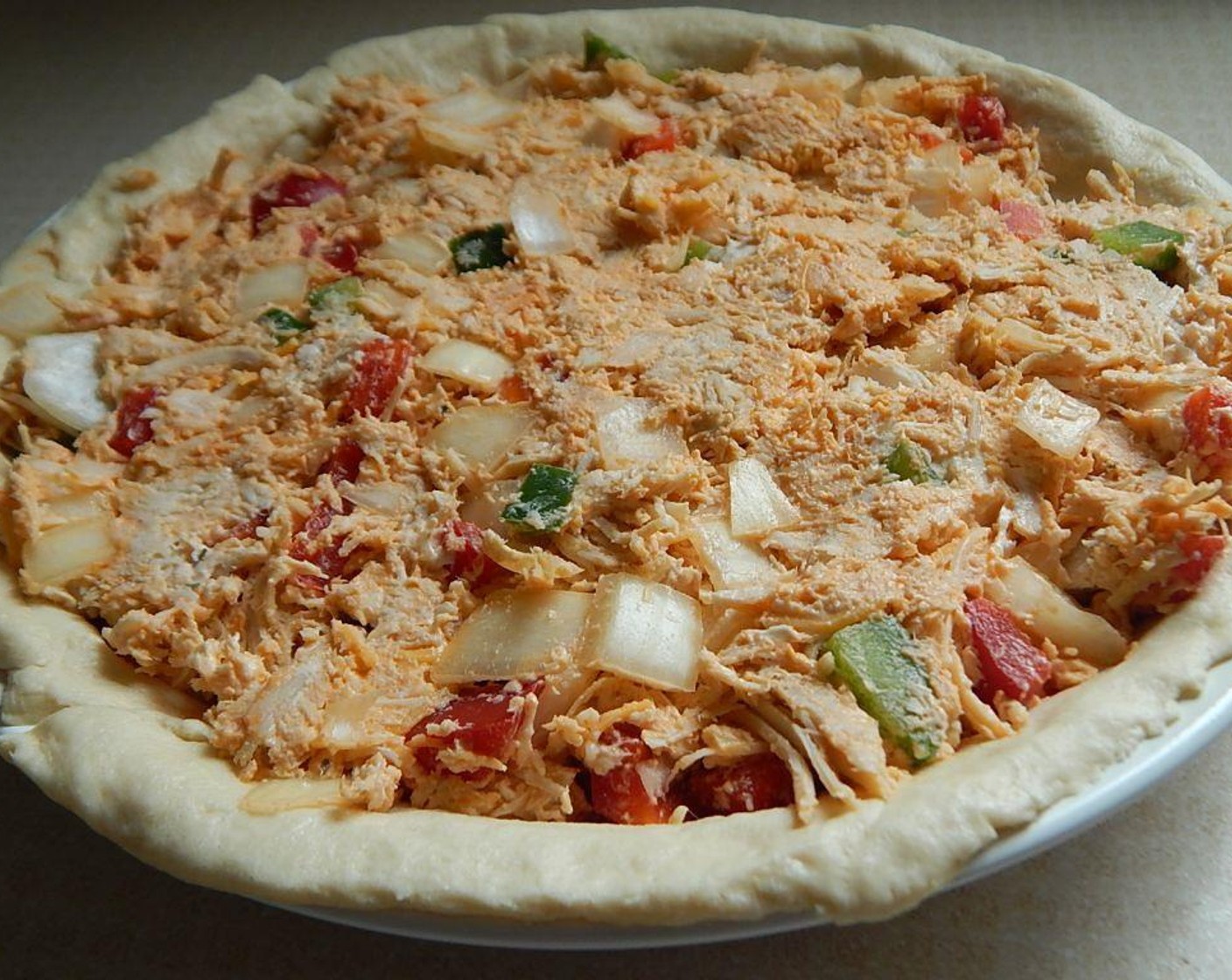 step 5 Scoop the chicken mixture into your pie dish, bake in the oven for 12 - 14 minutes.